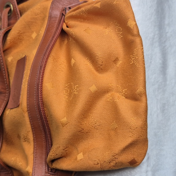 MCM Cognac Leather Drawstring Shoulder Crossbody Bucket Bag with Charm - Picture 16 of 17